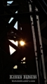 Walking down Queensboro Bridge, Queens NY. The sun is peering through the structure